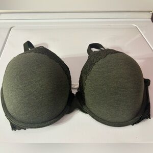 Cotton with lace trim. Never worn, took tags off before realizing wrong size